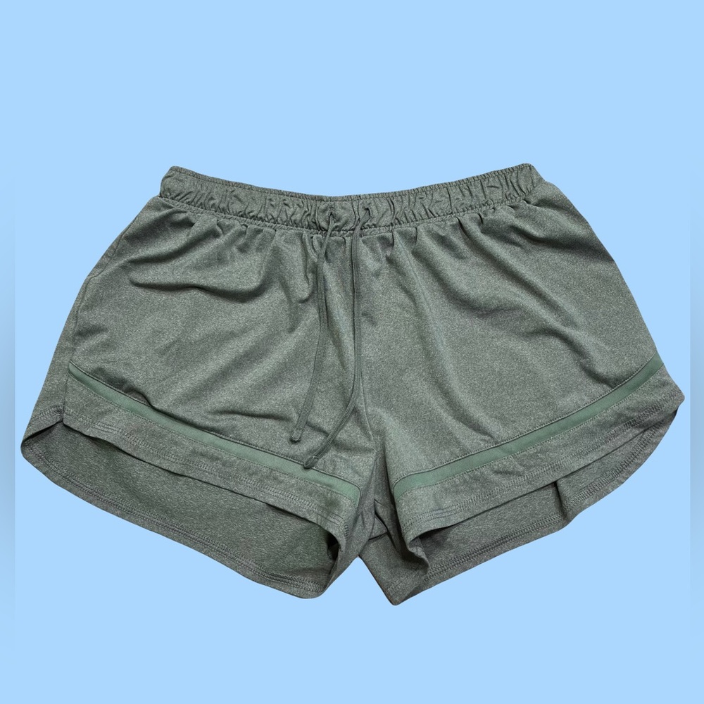 Green casual shorts with mesh detail